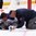 MONTREAL, CANADA - JANUARY 4: USA physiotherapist Stan Wong tends to Tyler Parsons #1 after he was injured during semifinal round action against Russia at the 2017 IIHF World Junior Championship. (Photo by Andre Ringuette/HHOF-IIHF Images)

